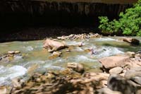 49-Kenny_continues_walking_through_the_water-this_time_through_rapids-adults_on_land_staying_dry