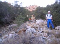 61-Bill_Harlan_and_Jorge_coming_down_steep_talus_slope_before_copper_mine