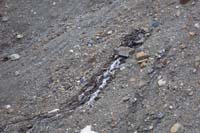 055-zoom_view_of_glacial_feature-spring_flowing_through_moraine_till