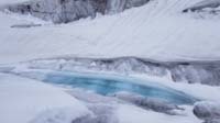 078-frozen_small_pool_of_glacial_blue_ice